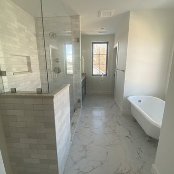 Primary bathroom remodel with freestanding tub and walk-in shower